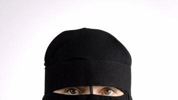 a woman wearing a black veil video
