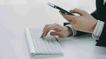 Service phone operators sit at shared desk focus on sales agent woman in headset use pc answers incoming calls talk with client provide professional support to customers sell company product concept video