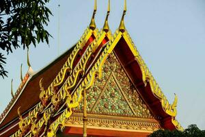 the roof of a temple in thailand photo