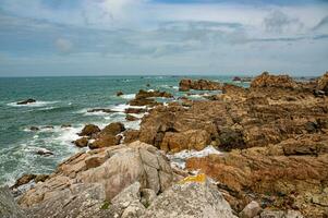 Enchanted Coastal Beauty Plougrescant's Gouffre d'Enfer, Brittany, France photo