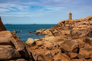 View of Ploumanac'h Lighthouse Mean Ruz Lighthouse - Brittany, France photo