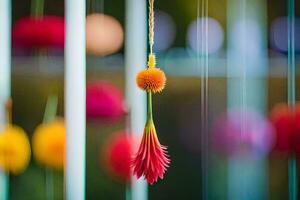 a colorful flower is hanging from a wire. AI-Generated photo