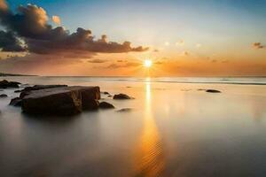 el Dom sube terminado el Oceano y rocas en el playa. generado por ai foto