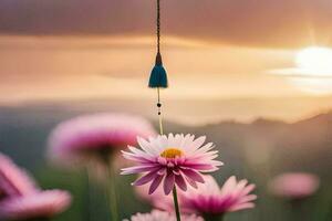 un rosado flor con un azul talón colgando desde él. generado por ai foto