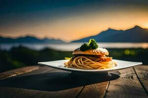 un plato con espaguetis y un hamburguesa en un mesa en frente de un puesta de sol. generado por ai foto