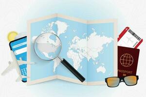 Travel destination USA, tourism mockup with travel equipment and world map with magnifying glass on a USA. vector