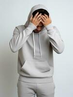 Asian man is sad on a minimalist neutral background AI Generative photo