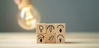 Creative idea, solution and innovation concept. Idea generation for business development. Wooden cube blocks with light bulb and cycle icons on clean background and copy space. AI Generative photo