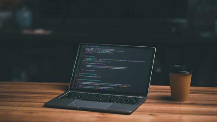 Laptop screen display blur script code, compiler, encode, debug, developer application software for business corporate with laptop computer. Instruction set of programming coding app from work at home