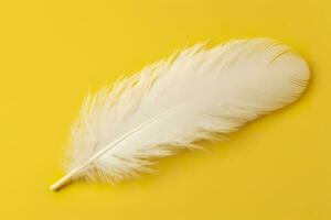 Close up of bright white feather. Copy space, yellow background. Fashion and Party concept. AI Generative photo