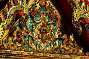 golden decorations on a temple photo