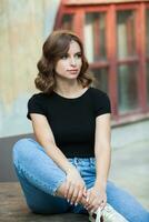 Close up portrait of a beautiful young woman smiling and looking at camera. White European girl with beautiful smile photo