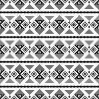 Seamless ethnic pattern. Aztec and Navajo tribal style. Geometric vector illustration with stripe decoration. Black and white color. Design textile, clothes, fashion, fabric, wrapping paper, ornament.