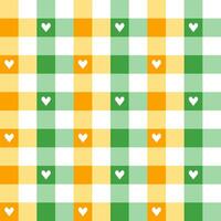 St. Patrick's day plaid pattern with heart background. plaid pattern background. plaid background. Seamless pattern. for backdrop, decoration, gift wrapping, gingham tablecloth, blanket, tartan. vector