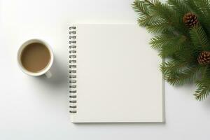 Christmas background with blank paper and decorations on a white table. photo