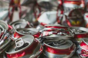 recycling concept, closeup crush a group can beer aluminium to recycle and save the environment photo