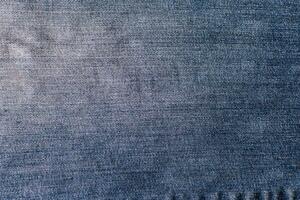 Abstract space perspective and a close-up of blank blue natural clean denim texture for traditional business background in fresh vibrant colors with diagonal gradient lines and dots. photo