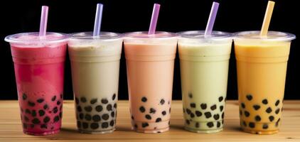 Plastic cups of different tasty bubble tea on wooden background. Generative AI photo