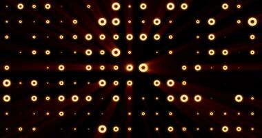 Abstract background of bright orange yellow glowing light bulbs from circles and dots of energy magic disco wall photo