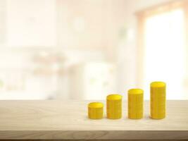 Stacks of gold coins in a row on a wooden table in a house photo