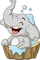 Cute elephant cartoon taking a bath vector