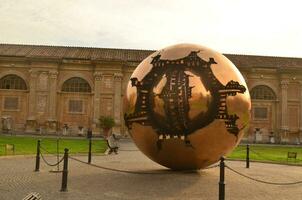 Beautiful large bronze sphere in vatican city photo