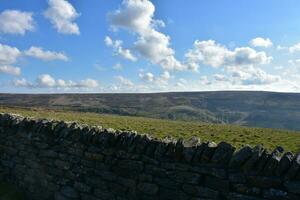 Rock Wall Lining a Lovely Farmland Landscape photo