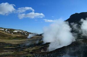 Valley with Steam Rising Up from Fumaroles photo