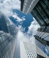 Looking up view of tall buildings photo