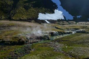 Puffs of Steam Rising Up Over the River photo