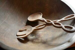 Beautiful Carved Wooden Salad Bowls with Wood Tongs photo