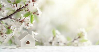 Toy house and cherry flowers, spring abstract natural background. Generative AI photo