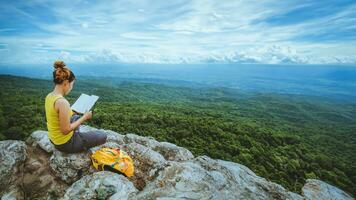 woman asians travel relax in the holiday. Sitting photo