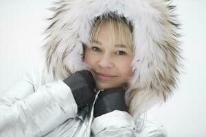 Woman in a furry furry hood photo