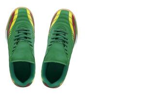 Green sneakers with bright inserts. Sport shoes on white background photo