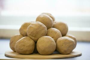 Pieces of clay balls on a plate. photo