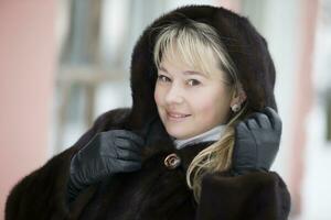 Portrait of a woman in a mink coat photo