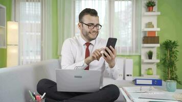 Flirtatious businessman chatting with women on the phone. video