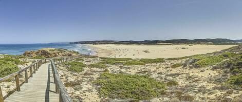 Panoramic image over Bordeiras Beach surf spot on the Atlantic coast of Portugal during the day photo