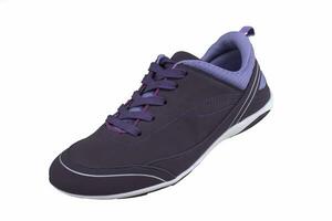 Sneaker purple on a white sole. Sport shoes on a white background. photo