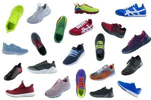 A lot of sneakers on a white background. Sport shoes photo