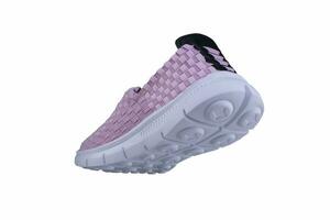 Sneaker pink on a white sole. Sport shoes on a white background. photo