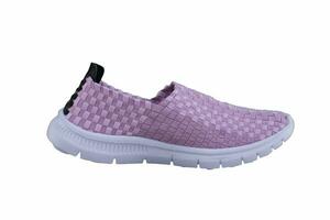 Sneaker pink on a white sole. Sport shoes on a white background. photo