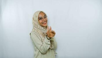 happy young asian woman in casual shirt. Charming female lady open hands palm up holding something on isolated White background. photo