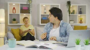 Mother helping her son with his lessons. Morale and support of mother to her son. video