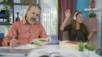 Father and daughter socializing at home. Father and daughter having a good time. video