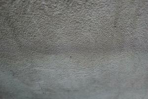 Cement and brick wall texture background, sun rays on the cement wall surface, smooth cement wall backdrop photo