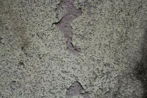 sucio cemento pared fondo, Envejecido arena pared superficie, resistido rústico pared fondo foto