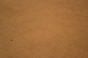 Shiny brown paper texture background, sun rays on the paper surface backdrop photo