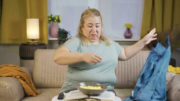 Lazy obesity woman messing up the house, dirty and scruffy. video